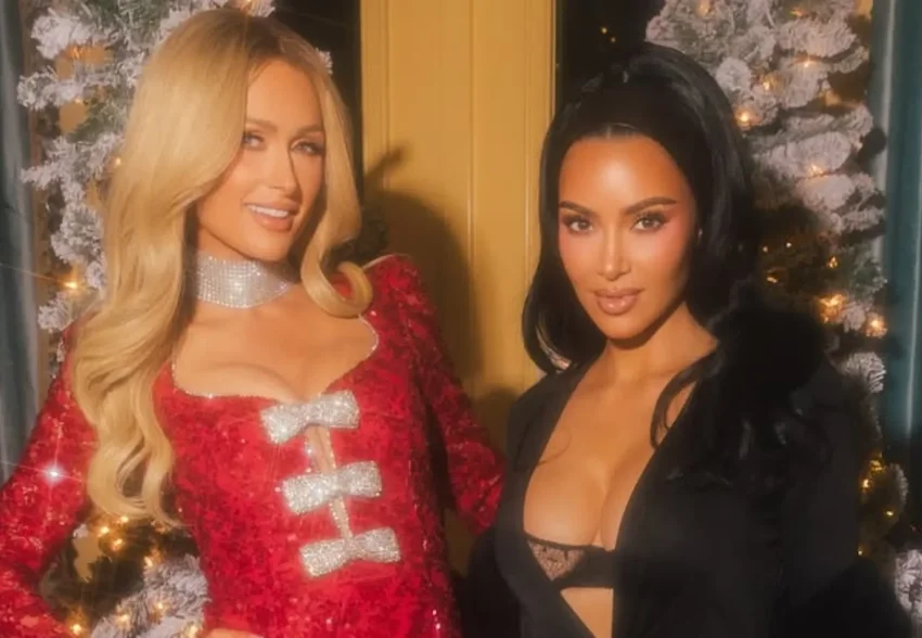 Кристен Стюарт, Ким Кардашьян (с декольте), Эмма Робертс и Пэрис Хилтон на рождественской вечеринке в Лос-Анджелесе